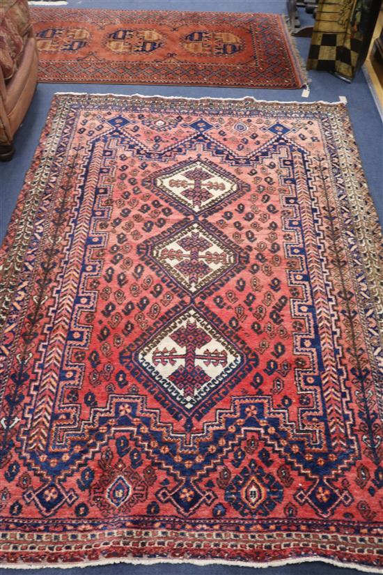 An Iranian Afshar red ground rug, and an Afghan Filpa terracotta ground rug, 215 x 155cm, 195 x 100cm